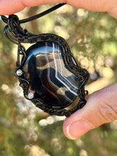 Load image into Gallery viewer, Black banded agate with labradorite + onyx gem accents wire wrapped pendant necklace