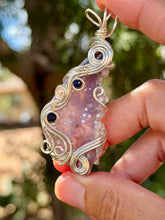 Load image into Gallery viewer, Artisan cab (positive rock) half polished grape agate with lapis lazuli + pearl gem accents wire wrapped pendant necklace