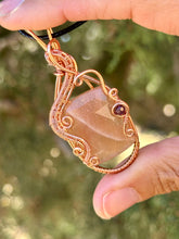 Load image into Gallery viewer, Faceted Peach moonstone with Ruby gem accent wire wrapped pendant necklace