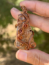 Load image into Gallery viewer, Artisan cab (positive rock) fossilized palm root with carnelian + garnet gem accents wire wrapped pendant necklace