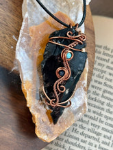 Load image into Gallery viewer, Reserved for Desiree k Obsidian arrowhead with turquoise + sapphire inclusions Wire wrapped pendant