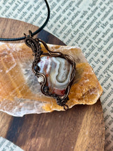 Load image into Gallery viewer, Reserved for Ann c DESIGNER STONE Mexican crazy lace agate with obsidian + citrine inclusions Wire wrapped pendant