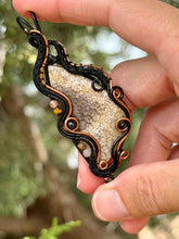 Load image into Gallery viewer, Artisan cab (positive rock) fossilized coral with peach moonstone, tiger eye, black tourmaline gem accents wire wrapped pendant necklace
