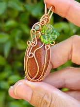 Load image into Gallery viewer, Goldstone “pumpkin” with green aventurine + peridot gem accents wire wrapped pendant necklace