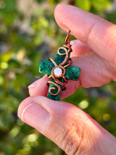 Load image into Gallery viewer, Ruby in zoisite cross with moonstone gem accent wire wrapped pendant necklace