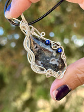 Load image into Gallery viewer, ARTISAN CAB (flintstone cabs) Marcasite in black agate with lapis lazuli + pyrite gem accents wire wrapped pendant necklace