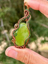 Load image into Gallery viewer, Green cat’s eye with green tourmaline gem accents wire wrapped pendant necklace