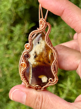 Load image into Gallery viewer, Indonesian (UV REACTIVE) Amber with carnelian + garnet gem accents wire wrapped pendant necklace