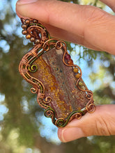 Load image into Gallery viewer, Artisan cab (positive rock) Scenic Plume Jasper with Garnet, Orange Garnet, Yellow Mookaite, Tiger Eye, Serpentine + Peridot Gem Accents wire wrapped pendant necklace