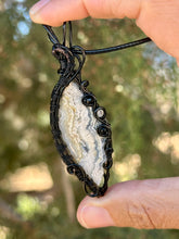 Load image into Gallery viewer, ARTISAN stone (Alisha Stolstig) White crazy lace agate with onyx + rutile quartz gem accents wire wrapped pendant necklace