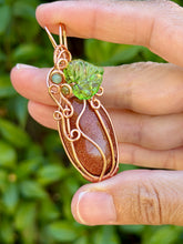 Load image into Gallery viewer, Goldstone “pumpkin” with green aventurine + peridot gem accents wire wrapped pendant necklace