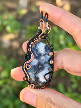 Load image into Gallery viewer, Artisan cab (positive rocks) scenic black maligano with sunstone, hematite, rutile quartz, opalite gem accents wire wrapped pendant necklace