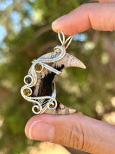 Load image into Gallery viewer, Artisan cab (positive rocks) fossilized palm root crescent moon with tiger eye + tourmaline gem accents wire wrapped pendant necklace