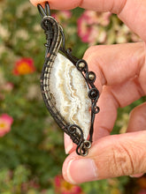 Load image into Gallery viewer, Artisan cab (positive rocks) white crazy lace agate with pyrite + onyx gem accents wire wrapped pendant necklace