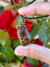Load image into Gallery viewer, Morrocan seam agate with garnet gem accents wire wrapped pendant necklace