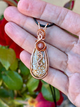 Load image into Gallery viewer, Dino Bone with cherry quartz gem accent wire wrapped pendant necklace