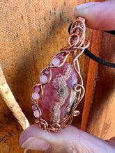 Load image into Gallery viewer, Reserved for jenni p Rhodochrosite with gem inclusions Wire Wrapped Pendent Necklacete