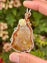 Load image into Gallery viewer, Artisan cab (positive rocks) orange tube agate with dandelion + moonstone gem accents wire wrapped pendant necklace