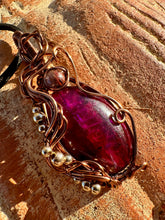 Load image into Gallery viewer, Reserved for Denise s Magenta Enhanced Lab with super 7 inclusions Wire Wrapped Pendent Necklace