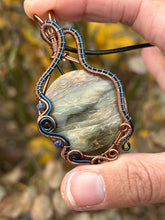 Load image into Gallery viewer, Reserved for ann c DUO TONED WIRE + DESIGNER CAB common blue opal with petrified wood with lapis lazuli + garnet inclusions Wire wrapped pendant