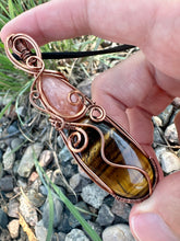 Load image into Gallery viewer, Reserved for Alina p Peach Moonstone + Tiger’s Eye wire wrapped pendent