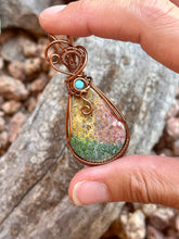 Load image into Gallery viewer, Artisan cab (positive rocks) rainbow fossilized palm root with turquoise gem accent wire wrapped pendant necklace