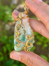 Load image into Gallery viewer, Artisan cab (positive rock) rainbow solar quartz druzy with Amazonite, green mica, serpentine, blue kyanite gem accents wire wrapped pendant necklace
