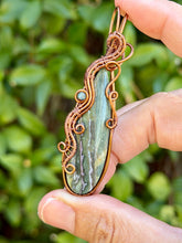 Load image into Gallery viewer, Artisan cab (positive rocks) Indian agate with blue kyanite gem accent wire wrapped pendant necklace