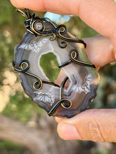 Load image into Gallery viewer, Artisan cab (Marina rabinskaya) window black agate with bats with labradorite gem accent wire wrapped pendant necklace