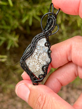 Load image into Gallery viewer, Artisan cab (positive rocks) black fossilized coral with obsidian + rutile quartz gem accents wire wrapped pendant necklace
