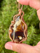 Load image into Gallery viewer, Indonesian (UV REACTIVE) Amber with carnelian + garnet gem accents wire wrapped pendant necklace