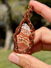 Load image into Gallery viewer, Artisan cab (positive rocks) red river jasper with goldstone + carnelian gem accents wire wrapped pendant necklace
