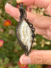 Load image into Gallery viewer, Artisan cab (positive rocks) white crazy lace agate with pyrite + onyx gem accents wire wrapped pendant necklace