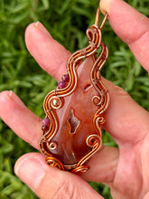 Load image into Gallery viewer, Artisan cab (positive rock) carnelian druzy with garnet + ruby + hematite gem accents wire wrapped pendant necklace