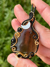 Load image into Gallery viewer, Artisan cab (positive rock) black lace obsidian with snowflake obsidian, citrine, mother of pearl moon gem accent wire wrapped pendant necklace