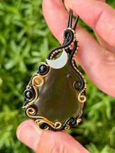 Load image into Gallery viewer, Artisan cab (positive rock) black lace obsidian with snowflake obsidian, citrine, mother of pearl moon gem accent wire wrapped pendant necklace
