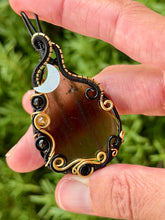 Load image into Gallery viewer, Artisan cab (positive rock) black lace obsidian with snowflake obsidian, citrine, mother of pearl moon gem accent wire wrapped pendant necklace