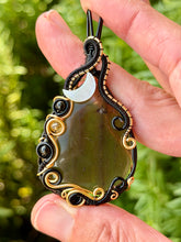 Load image into Gallery viewer, Artisan cab (positive rock) black lace obsidian with snowflake obsidian, citrine, mother of pearl moon gem accent wire wrapped pendant necklace