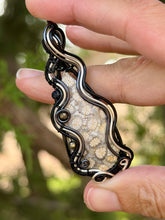 Load image into Gallery viewer, Artisan cab (positive rocks) fossilized coral with pyrite + onyx gem accents wire wrapped pendant necklace