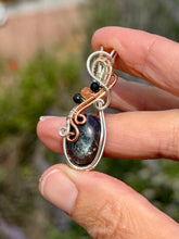 Load image into Gallery viewer, Artisan cab Bloodshot Iolite (sunstone/iolite) with rutile quartz + sunstone gem accents wire wrapped pendant necklace