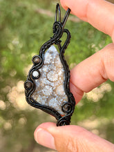 Load image into Gallery viewer, artisan cab (positive rock) black fossilized coral with obsidian + moonstone gem stone accents wire wrapped pendant necklace
