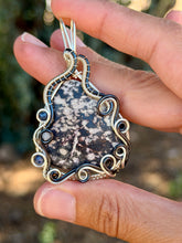 Load image into Gallery viewer, Artisan cab (johari gems) kammererite with sapphire + Angelite gem accent wire wrapped pendant necklace

