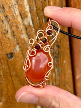 Load image into Gallery viewer, Carnelian with tigers eye + garnet inclusions Wire wrapped pendant
