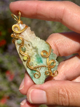 Load image into Gallery viewer, Artisan cab (positive rock) rainbow solar quartz druzy with Amazonite, green mica, serpentine, blue kyanite gem accents wire wrapped pendant necklace
