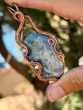 Load image into Gallery viewer, Artisan cab (positive rock) sky moss agate doublet with chrysopease + dumortierite gem accent wire wrapped pendant necklace
