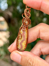 Load image into Gallery viewer, Artisan cab (casdans) yellow crazy lace agate with citrine gem accent wire wrapped pendant necklace
