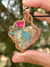 Load image into Gallery viewer, Artisan cab (adit stones) rainbow fossilized coral with blue apatite, turquoise, peridot gem accents wire wrapped pendant necklace
