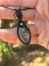 Load image into Gallery viewer, Black fossilized coral with mother of pearl gem accent wire wrapped pendant necklace
