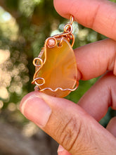 Load image into Gallery viewer, Orange agate with  sunstone gem accent wire wrapped pendant necklace
