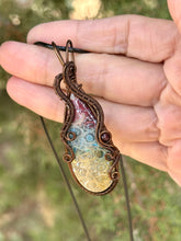Load image into Gallery viewer, Rainbow Fossilized Palm Root with garnet gem accent wire wrapped pendant necklace
